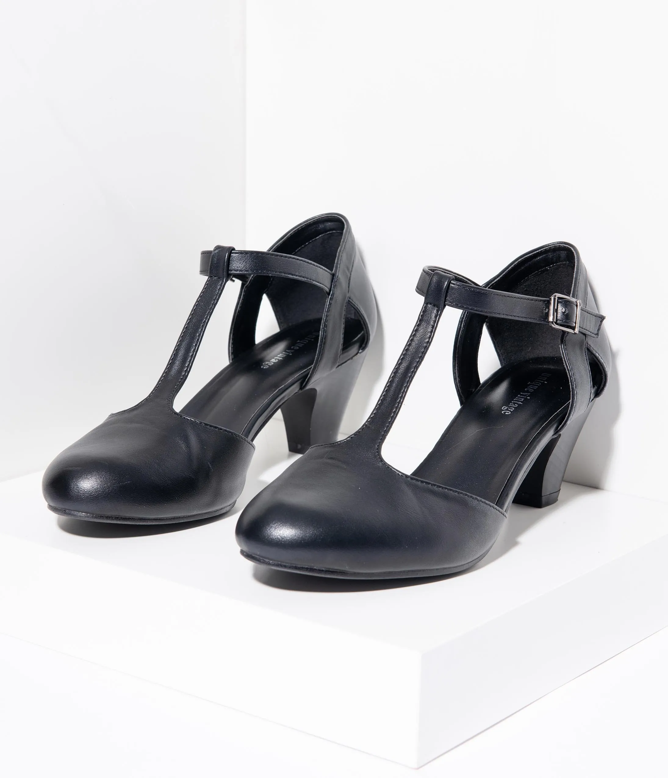 Unique Vintage Black Leatherette Closed Toe T-Strap Roxy Pumps